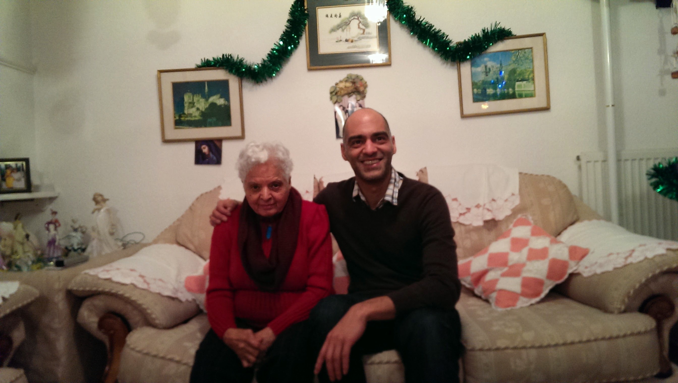 Surjit smiling with a family member during Christmas celebrations
