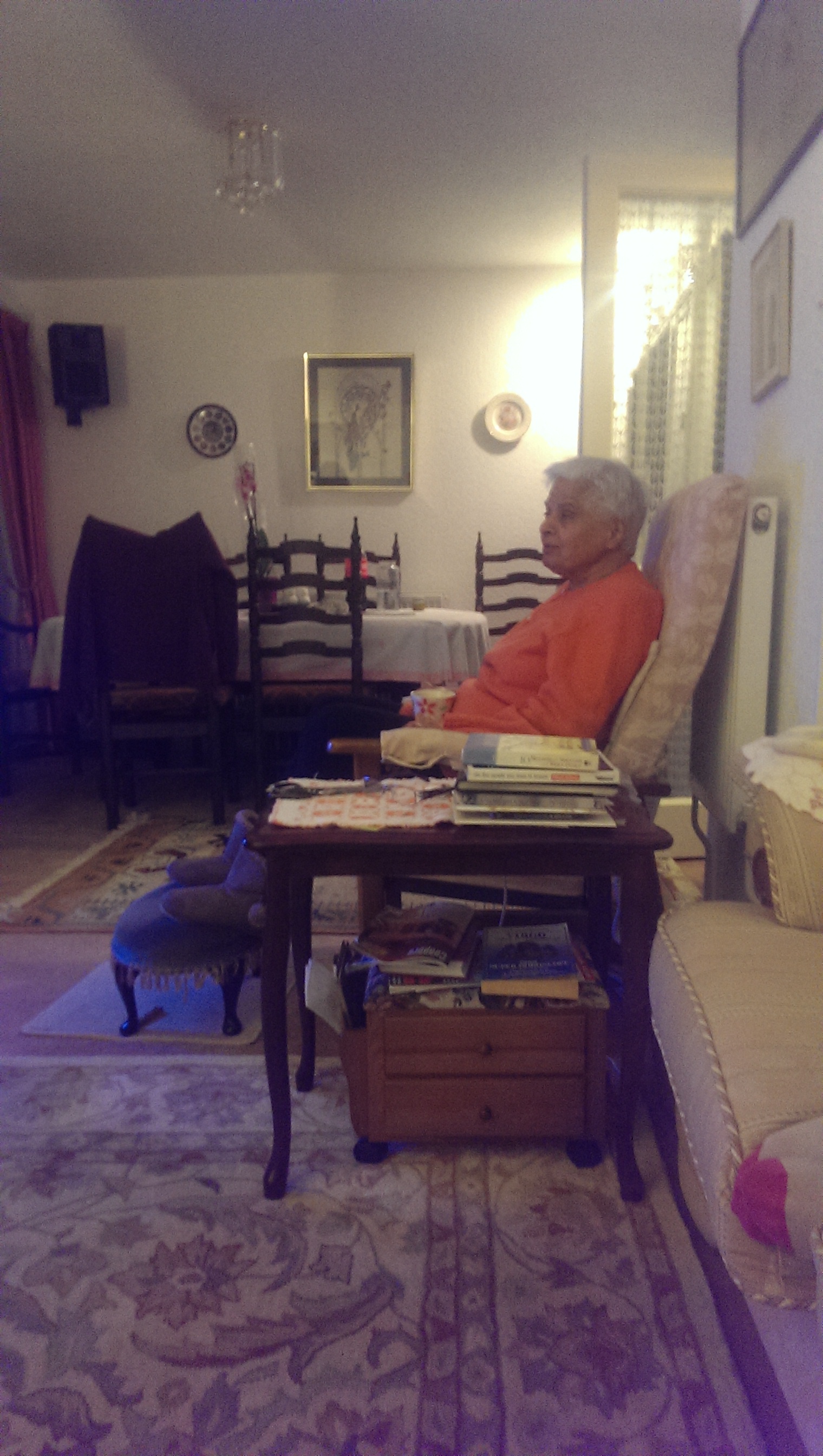 Surjit in her living room, a view of her cherished home