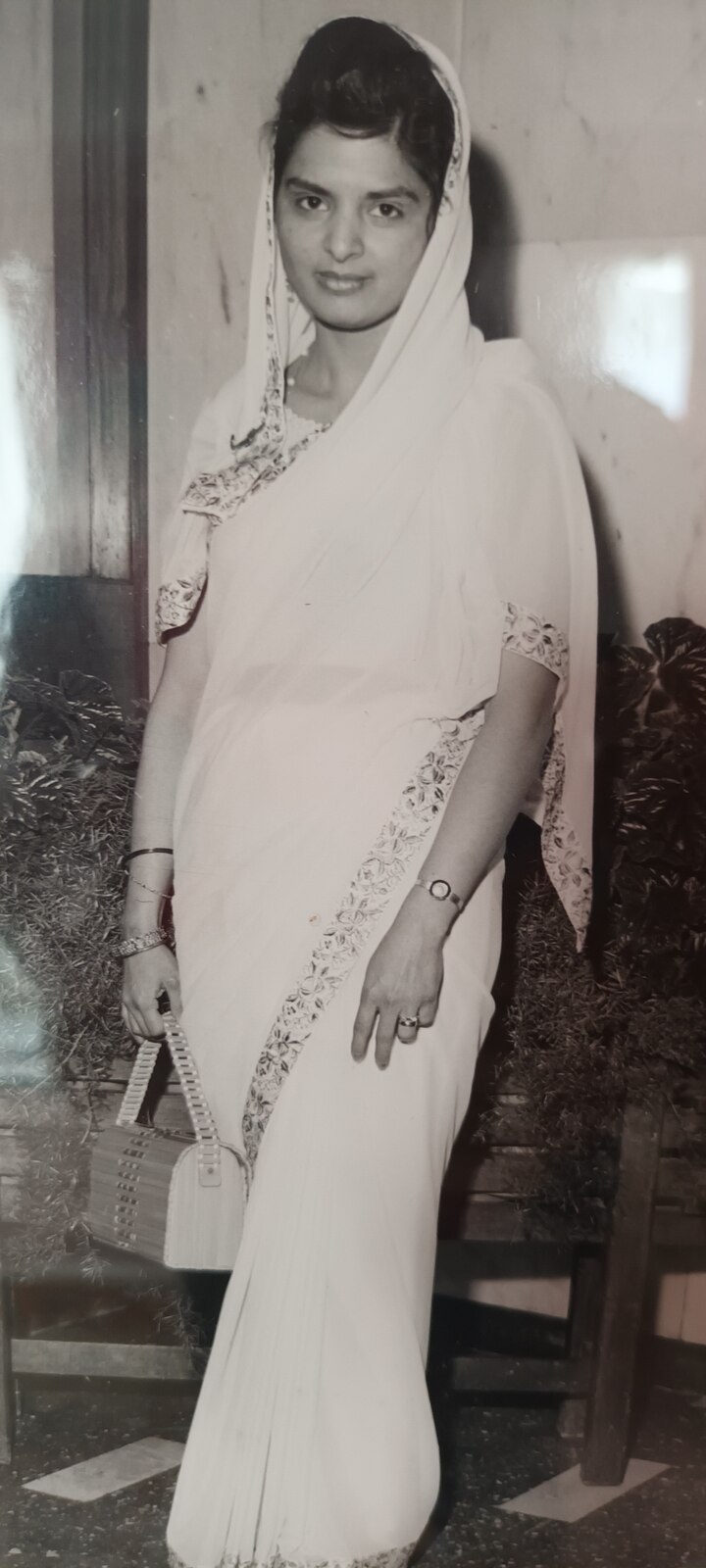 Surjit in an elegantly embroidered white suit — a beautiful vintage portrait