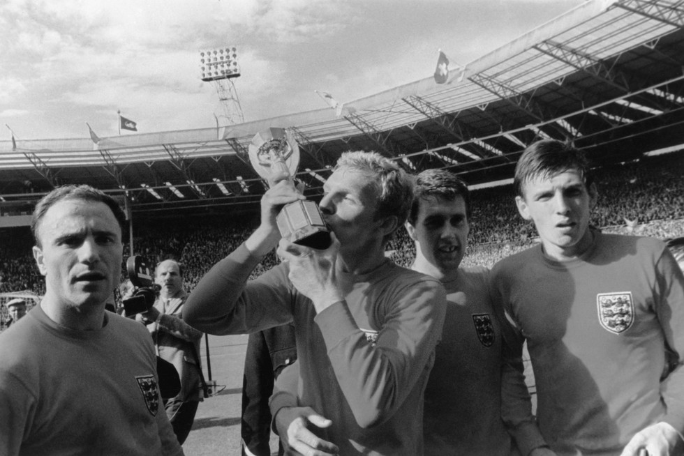 England players celebrating the 1966 World Cup win at Wembley