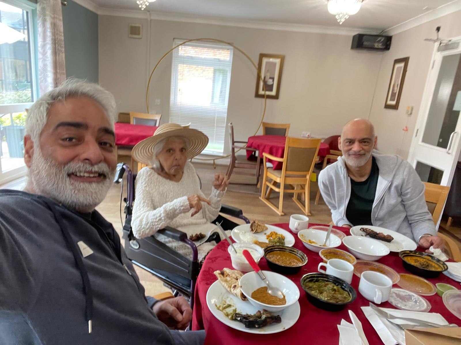 Surjit enjoying a family meal together with both her sons