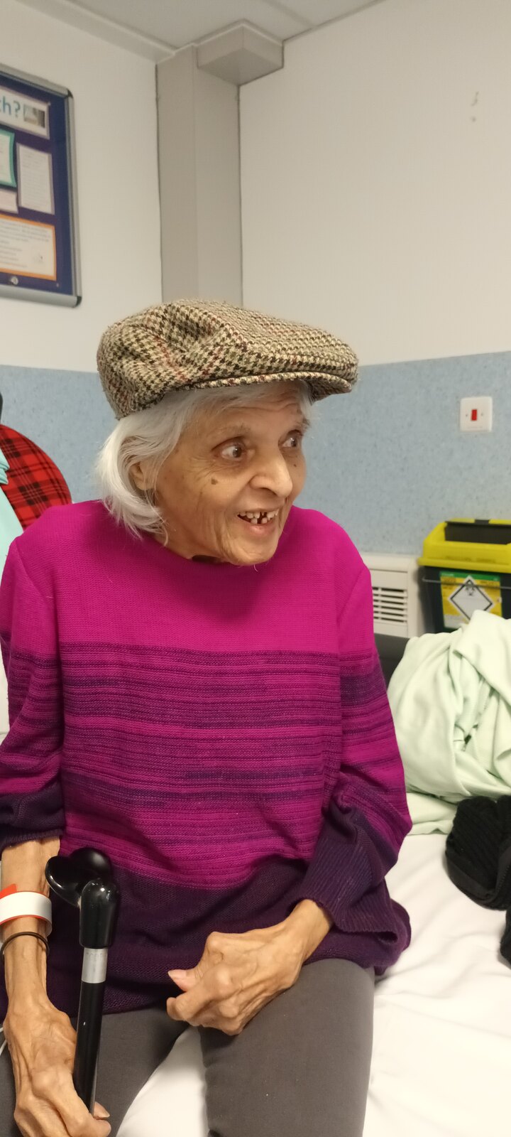 Surjit looking full of character in a flat cap
