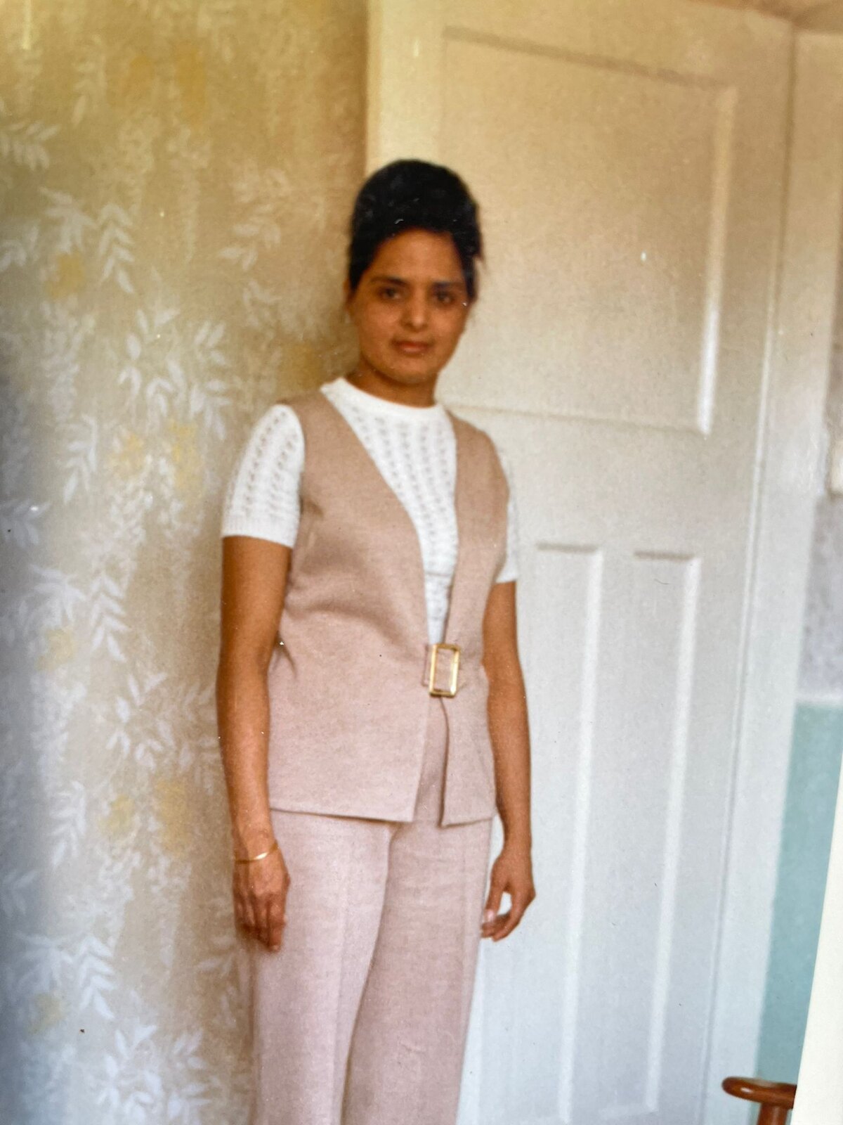 Surjit looking effortlessly stylish in a 1960s outfit at home